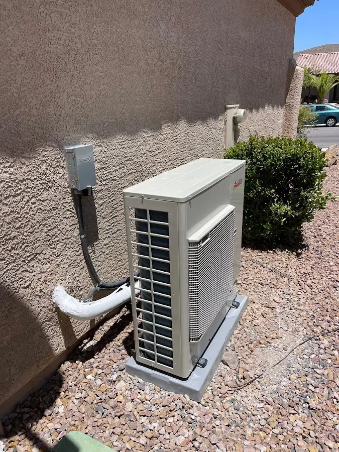 Residential air conditioning condenser unit in Estherville
